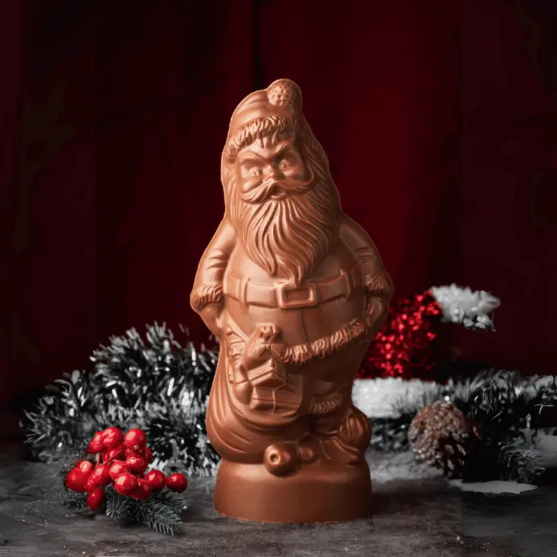 Decadent Chocolate Santa, a symbol of festive luxury, crafted from the finest cocoa. Immerse yourself in the rich, velvety taste of premium chocolate, transforming your celebration into an exquisite experience.