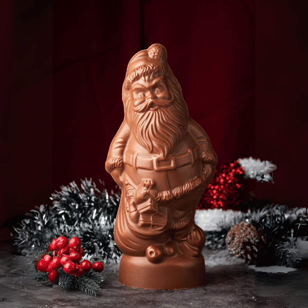 Decadent Chocolate Santa, a symbol of festive luxury, crafted from the finest cocoa. Immerse yourself in the rich, velvety taste of premium chocolate, transforming your celebration into an exquisite experience.
