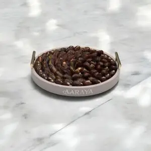 AARAYA® Luxury Assorted Dates Tray Desert Jewel – 35 cm tray filled with 1.7 kg of luxury dates with premium fillings like pistachio ganache, salted hazelnut, and orange peel. Perfect for Ramadan, gifting, and special occasions.