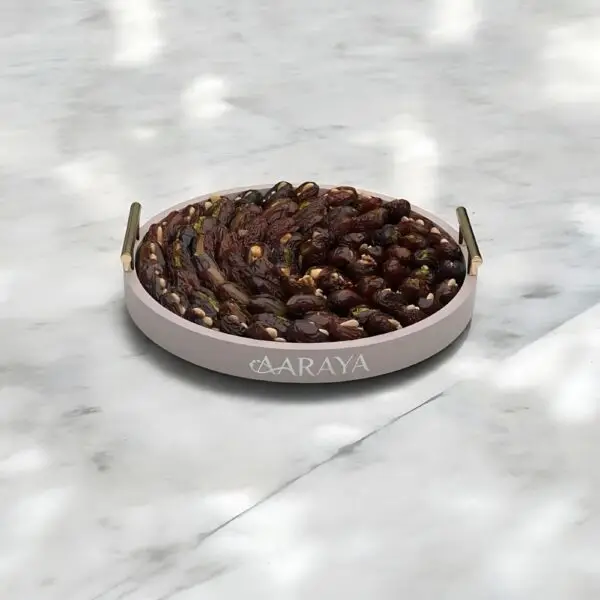 AARAYA® Luxury Assorted Dates Tray Desert Jewel – 35 cm tray filled with 1.7 kg of luxury dates with premium fillings like pistachio ganache, salted hazelnut, and orange peel. Perfect for Ramadan, gifting, and special occasions.